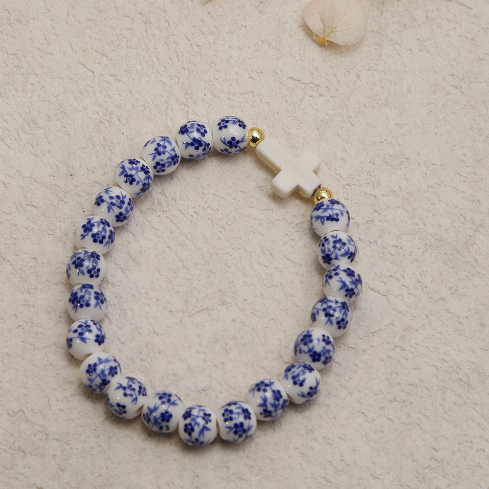 Kit de 2 Pulseiras WWJD com Cruz e Cerâmica Floral
