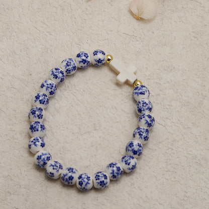 Kit de 2 Pulseiras WWJD com Cruz e Cerâmica Floral