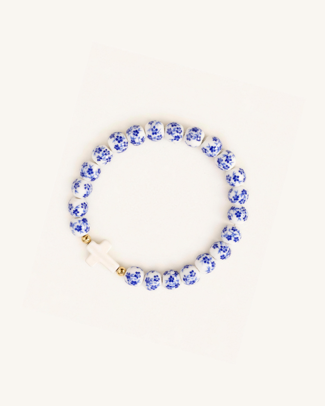 Kit de 2 Pulseiras WWJD com Cruz e Cerâmica Floral