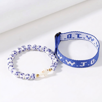 Kit de 2 Pulseiras WWJD com Cruz e Cerâmica Floral